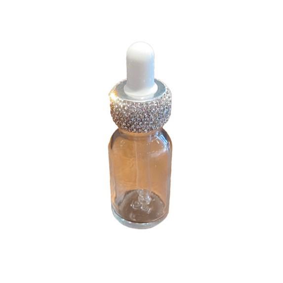 Diamond-Inlaid Frosted Glass Essential Oil Bottle with Rubber Dropper for Serums and Liquid Cosmetics.