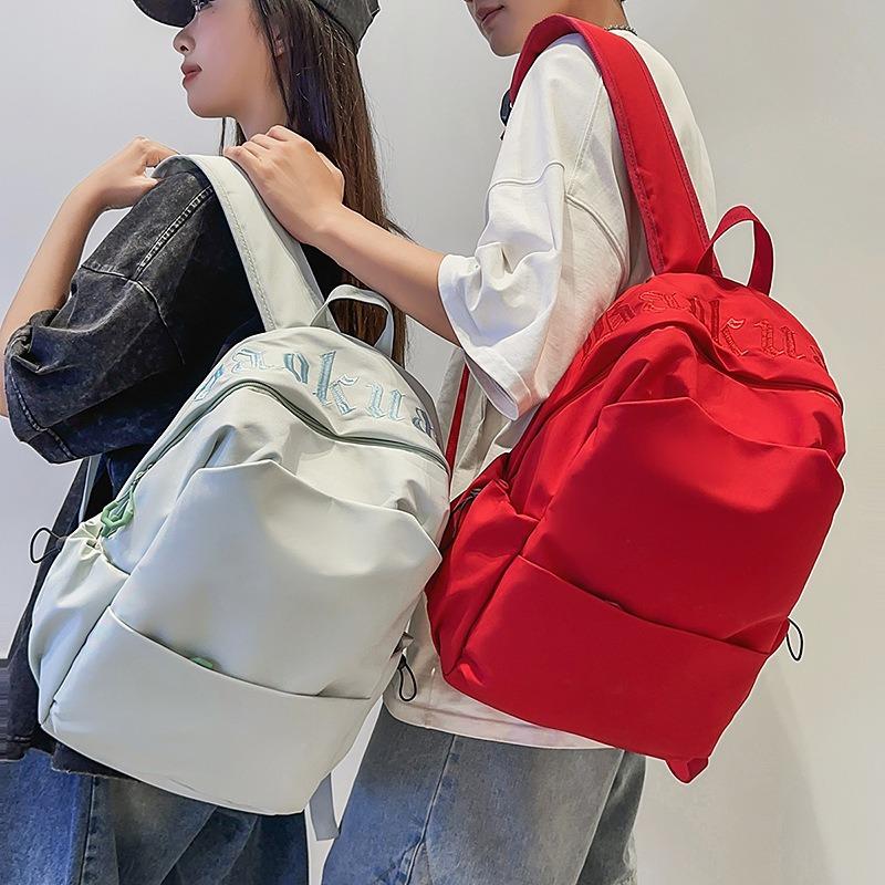 High value solid color simple backpack couple light travel mountaineering large capacity backpack