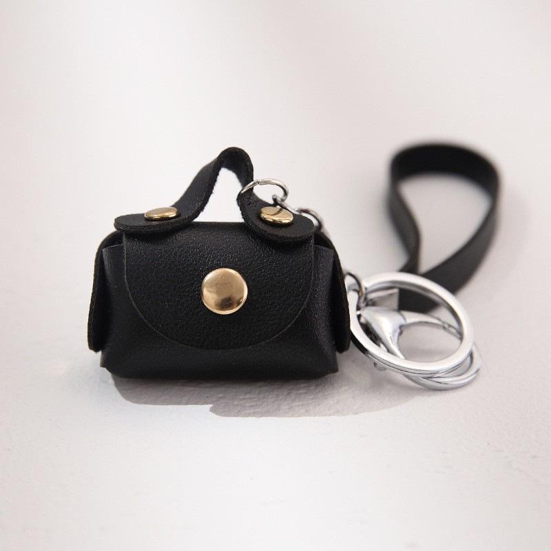 PU Leather Bracelet Coin Purse Keychain: Cute Mini Bag for Earphones & Data Cables
