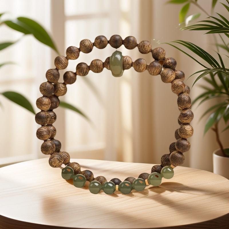 

Hainan Qi Nan Agarwood Bracelet, Hetian Jade Qi Nan Double-Circle Women s Bracelet, Original Design, High-End Sandalwood and Agarwood 6mm Qi Nan Agarwood and H