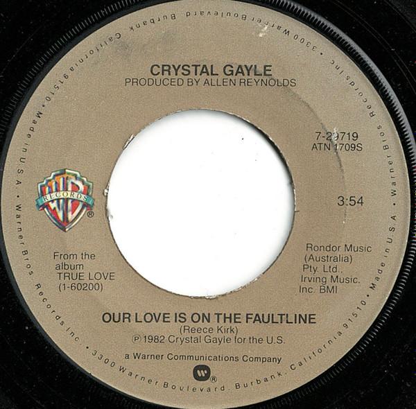 

7inch Record CRYSTAL GAYLE - Our Love Is On The Faultline / Deep 729719 Warner Bros. Re 1982 US Pop Used