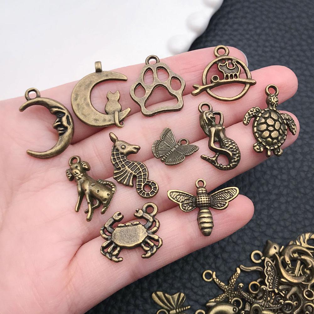 100 Antique Bronze Animal & Insect Alloy Pendants: Dragonfly, Butterfly Charms for DIY Bracelets, Necklaces, Keychains
