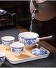 Compact Travel Tea Set with Automatic Rotating Teapot and Side Handle Kung Fu Cups