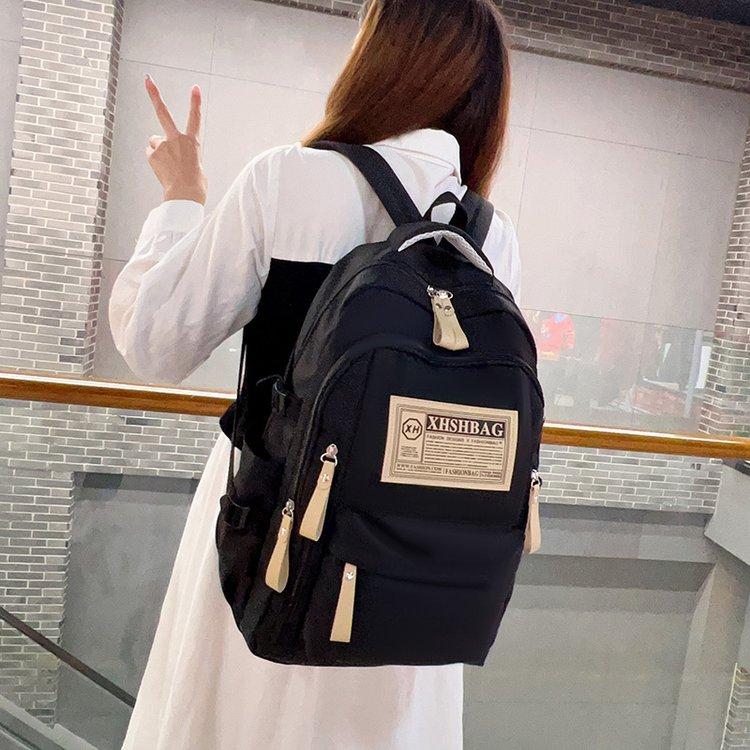 Schoolbag wholesale college students Oxford cloth computer backpack high value simple versatile schoolbag anti-splashing backpack women