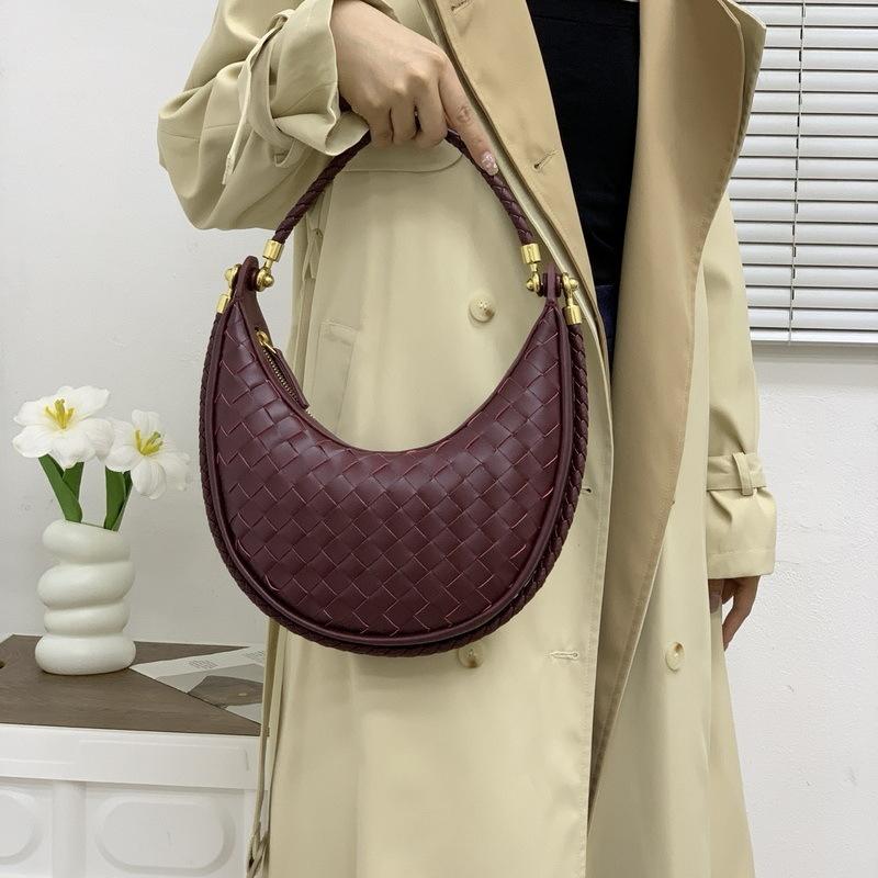 2025 Neue Damenhandtasche aus echtem Leder Handgewebte Achseltasche Vielseitige Halbmondtasche Einzelne Schulter Diagonale Umhängetasche Knödel-Damenhandtasche