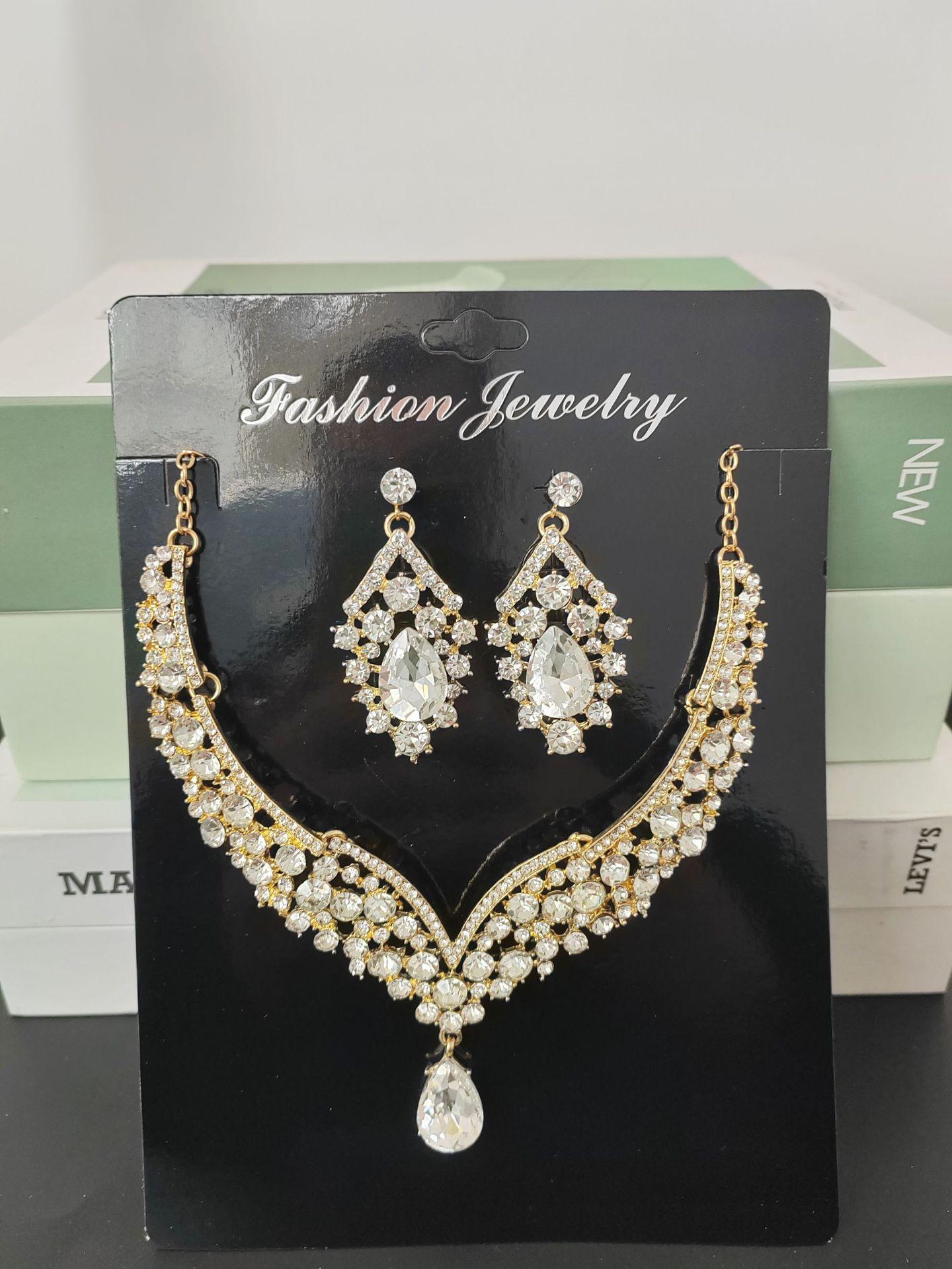 

Ювелирные изделия Преувеличенный комплект ожерелья Роскошные хрустальные украшения Банкетное платье Аксессуары Прямая партия