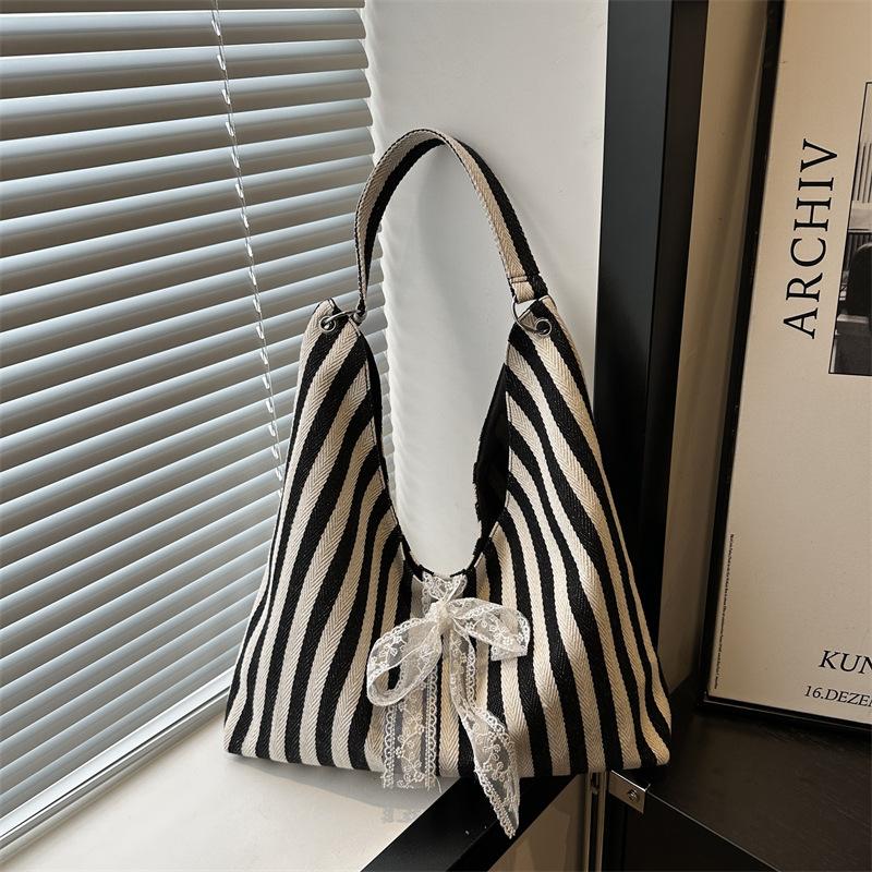 

Striped canvas bag women s summer 2025 new trendy Korean niche tote bag student class large-capacity cloth bag синий