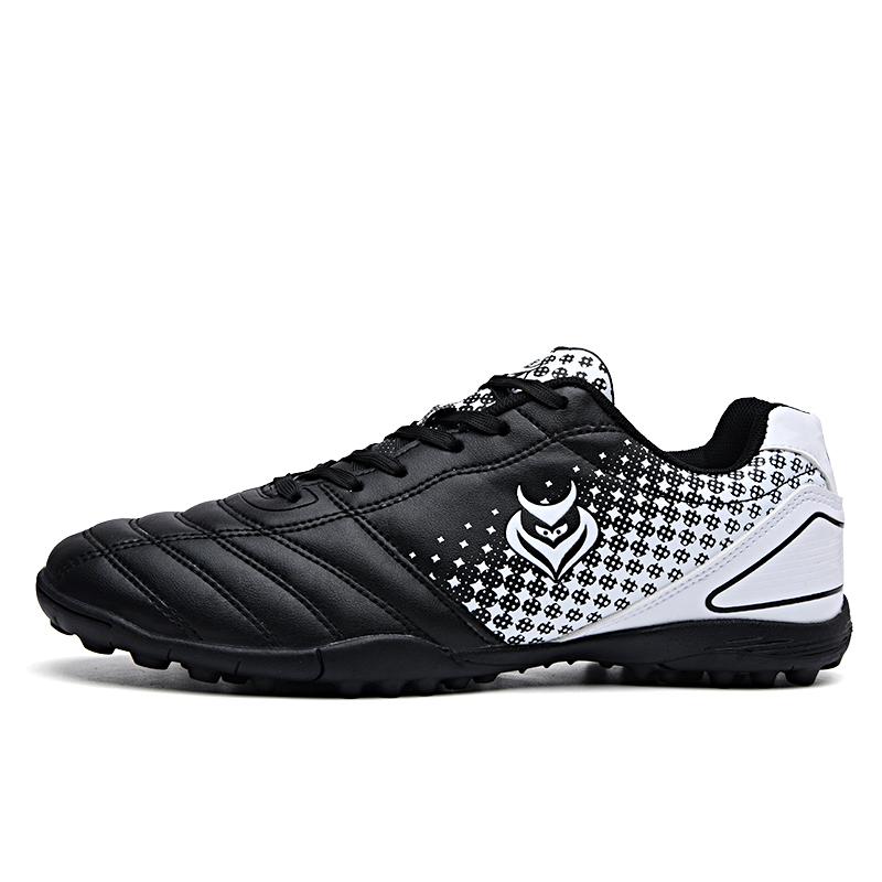 უნისექსის ტყავის რეზინის რბილი ქვედა ფრჩხილის მოკლე ფრჩხილის საფეხბურთო ფეხსაცმელი ახალგაზრდული შეჯიბრის პროფესიული ფეხბურთის ფეხსაცმელი