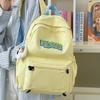 In Spring  The New Korean Isn Joker Students' Large Capacity Schoolbags Are Simple and Lightweight Outdoor Travel Backpacks.