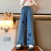 Fasjonable jenters vide jeans: Trendy vår- og høststil for store barn