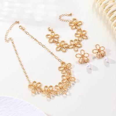 Retro Metal Hollow Flower Jewelry Set: Necklace, Bracelet, Earrings & Ring for Elegant Women
