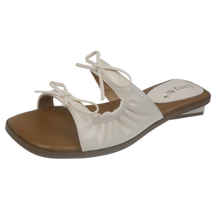 

Medium heel nude fairy wind small cool slippers women s shoes wear 2025 new summer bow holiday sandals 40