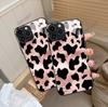 Hot-selling black cow pattern is suitable for iPhone17 light luxury glass protective case, Apple 16 Korean mobile phone case.