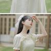 Kleines französisches Retro-Sommerkleid mit Schleife und quadratischem Ausschnitt