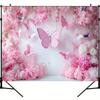 A Vibrant Birthday Decoration Display Featuring Butterflies and Flowers - a Sturdy Pink Backdrop