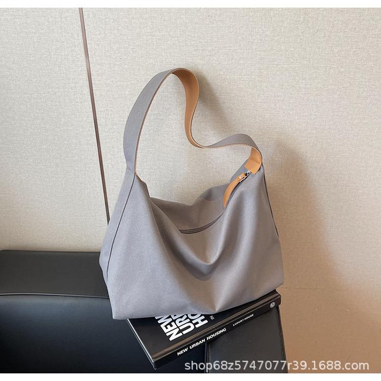 

Super fire canvas bag messenger bag women s 2025 new model new versatile fashion tote bag casual commuter bag