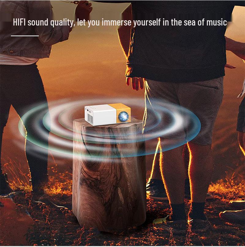Best-Selling YG300 Yellow-White Mini Portable Projector with Mobile Screen Mirroring for Home Entertainment.