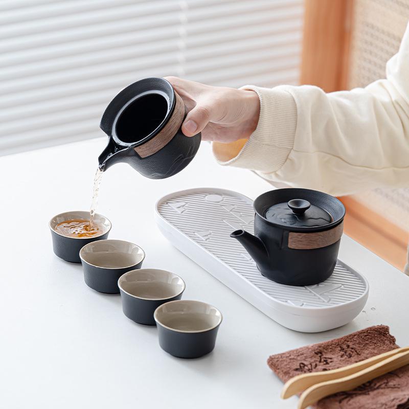 Elegant Portable Ceramic Tea Set with Wooden Tray: 1 Teapot & 4 Cups for Outdoor Adventures