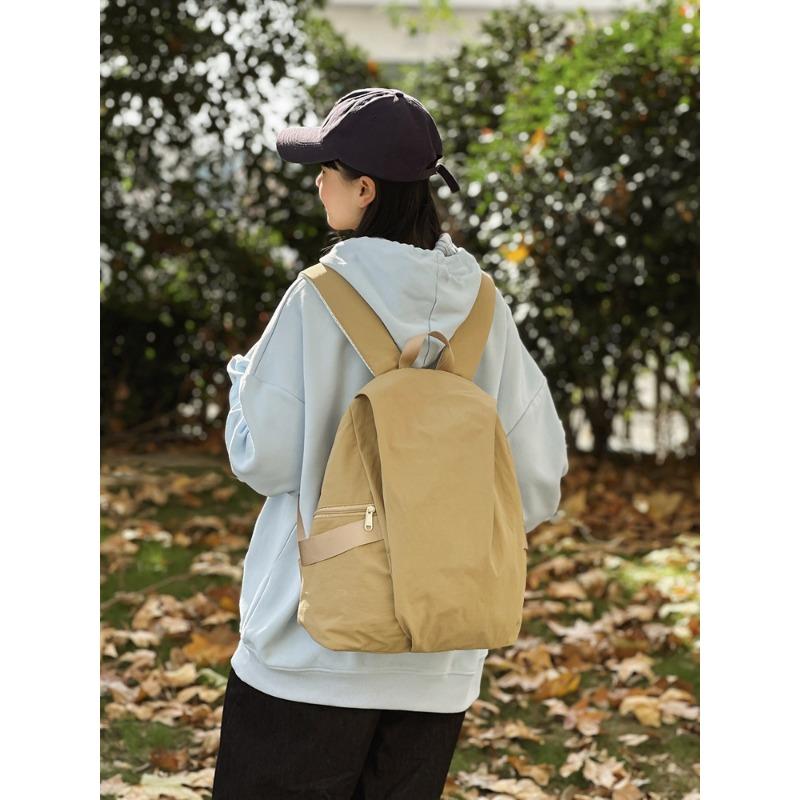 Casual simple and lightweight backpack, student schoolbag, new versatile commuter large-capacity travel backpack