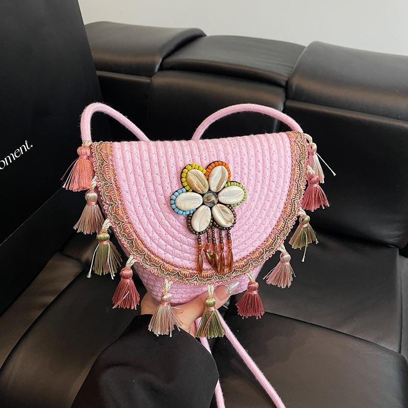 Summer vacation handwoven bag new fashion fringed beach shoulder messenger bag women's bucket bag