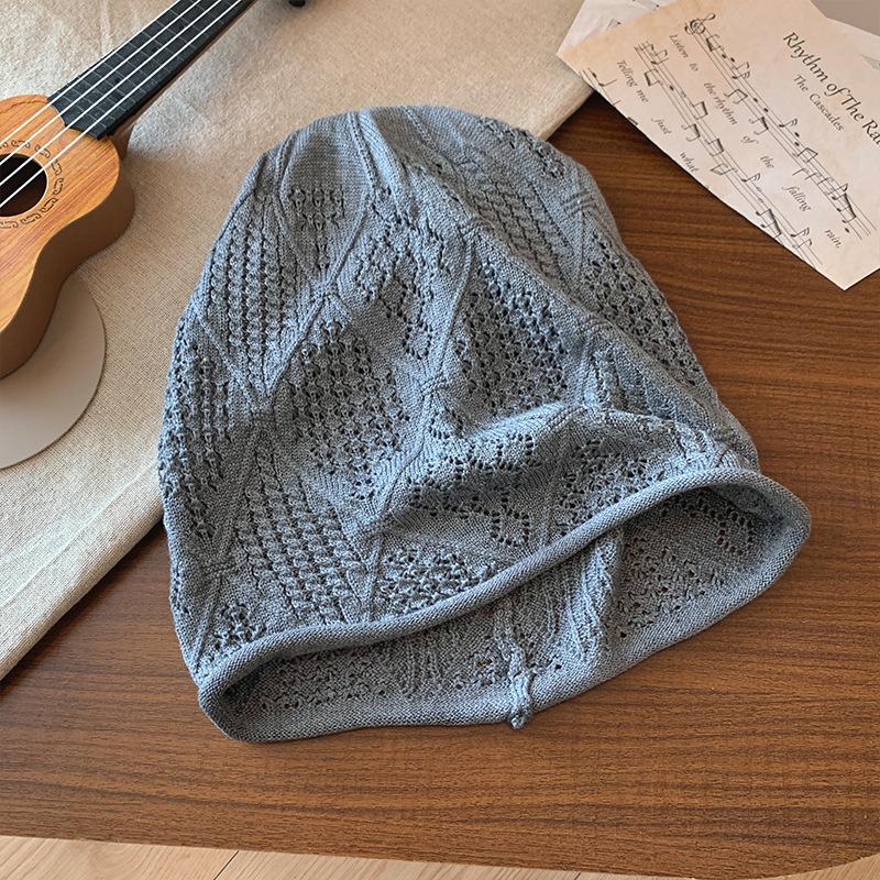 Knitted hollow stack hat female face small bag head cold hat Korean version versatile big head circumference loose hat