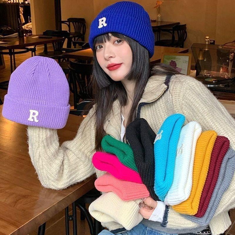 Hat winter female high-value round face student versatile cold-proof warm face small knitted wool hat