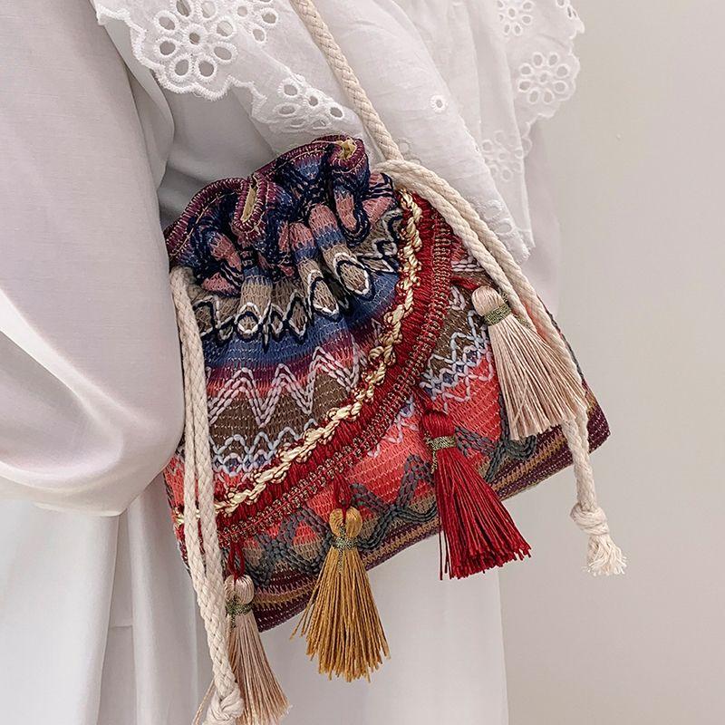 

Популярная этническая сумка ручной работы от интернет-знаменитости 2025 Новая модная оригинальная сумка-ведро с кисточками на плечо/через плечо красный