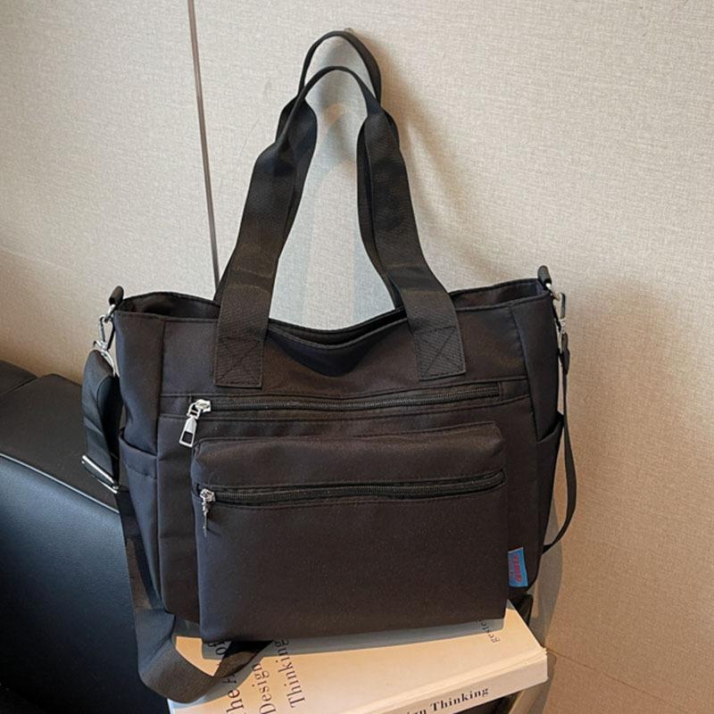 

Нейлоновая тканевая сумка женская большой вместимости новая осенне-зимняя повседневная универсальная сумка-мессенджер через плечо для студентов чёрный