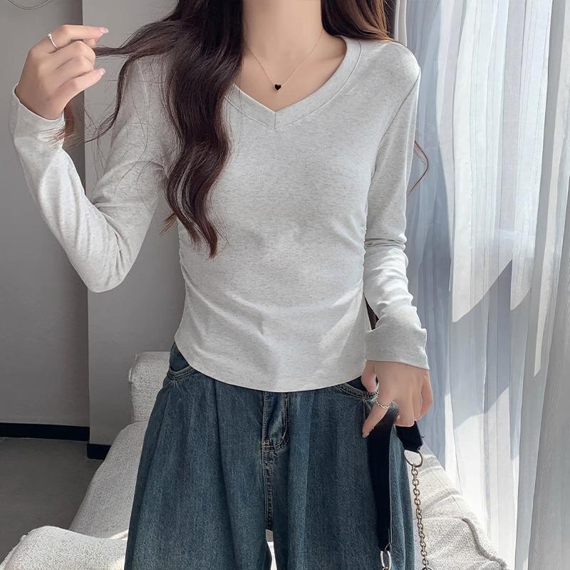 Designový smysl niche tričko s dlouhým rukávem trendy značky v pase s výstřihem do V dámské jarní a podzimní slim nepravidelný lem hot girl krátký top