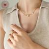 Celebrity-Inspired Gold-Plated Titanium Steel Necklace with Zircon Root-Shaped Pendant