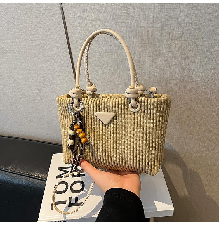 

Маленькая женская сумка 2025 осень-зима новая корейский нишевый дизайн ретро портативная сумка-ведро зарубежный стиль на плечо через плечо хаки