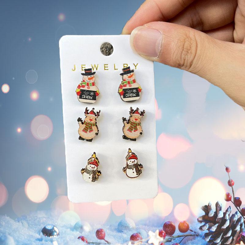 

3 пары сережек в виде оленя и рождественской елки для женщин, милые эмалевые серьги-гвоздики в виде снеговика с каплями масла из дерева, ювелирные изделия в подарок