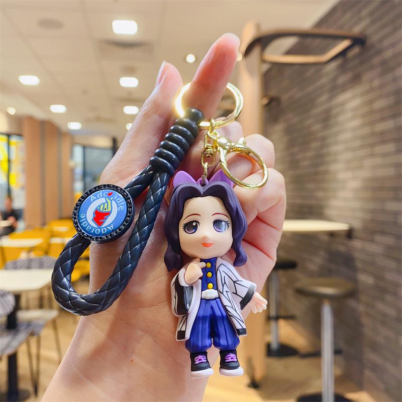 Cartoon Kreativer Geist Tötendes Schwert Dreidimensionale Figur Schlüsselanhänger Lustiger Schulranzen Anhänger Auto Schlüsselanhänger Geschenk