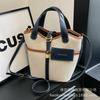 Canvas niche contrasting color handbag women's 2025 summer new Korean fashion shoulder messenger bag versatile bucket bag