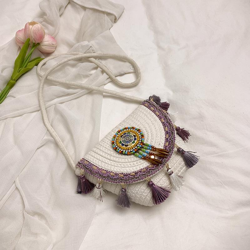 

Модные и популярные соломенные плетеные сумки, универсальные сумки-мессенджеры с бахромой в этническом стиле, плетеные сумки для женщин с литературным стилем для отдыха на море фиолетовый