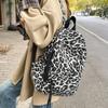Leopard Print Backpack Casual Daily Use Trendy Street Style Lightweight Backpack for Women with Tassel Detail for School Travel and Everyday Outings