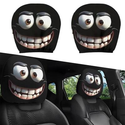2 ks potahů na opěrku hlavy do auta Černý potisk s kreslenými očima Pro univerzální auto Pružný materiál Snadná instalace a demontáž Nářadí