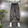 Spring and Summer Men's Flocking Sports Simple Fashion Versatile Outdoor Trend Loose Tied Feet Elastic Casual Pants Tide