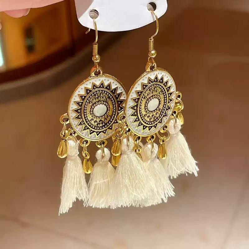 

Богемные длинные серьги с кисточками и подвеской в виде листа - стиль Юньнань Дали Лицзян