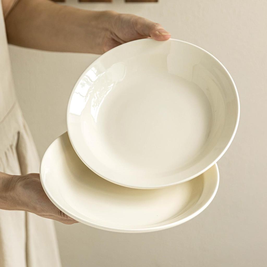 Cream-Colored Minimalist Ceramic Tableware: Deep, Round Plates for Vegetables, Dinner, and Salads.