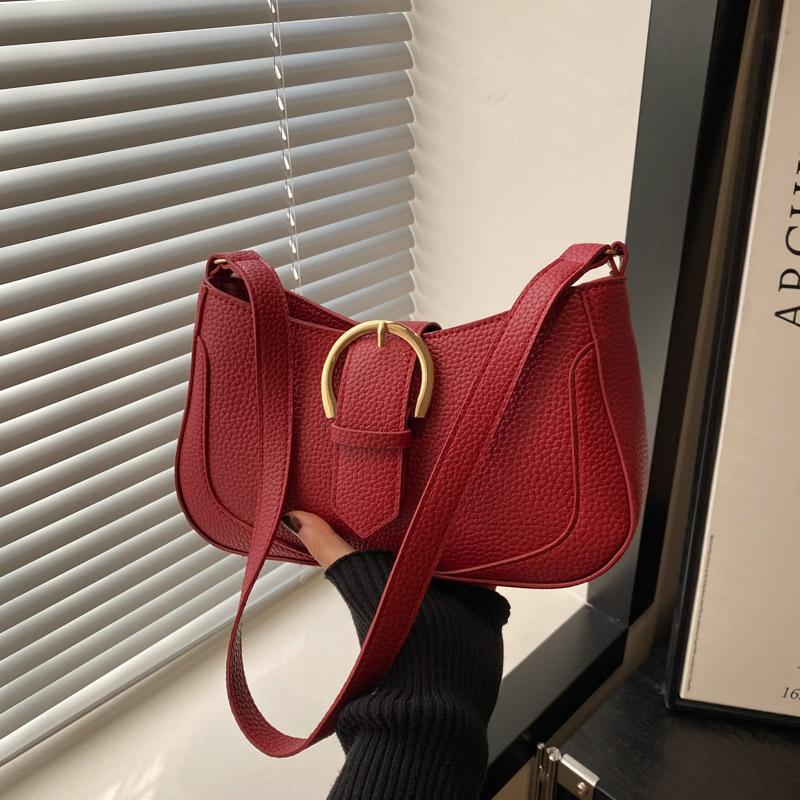 

Retro niche bag women s 2025 new autumn super fire versatile messenger bag Korean version of high-end shoulder armpit bag красный