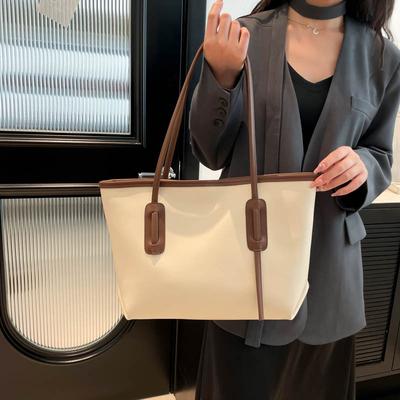 Einfache und großvolumige Tragetasche, Damen-Großtasche, Schultertasche mit Kontrastfarbe, Studententasche, Canvas-Tasche.