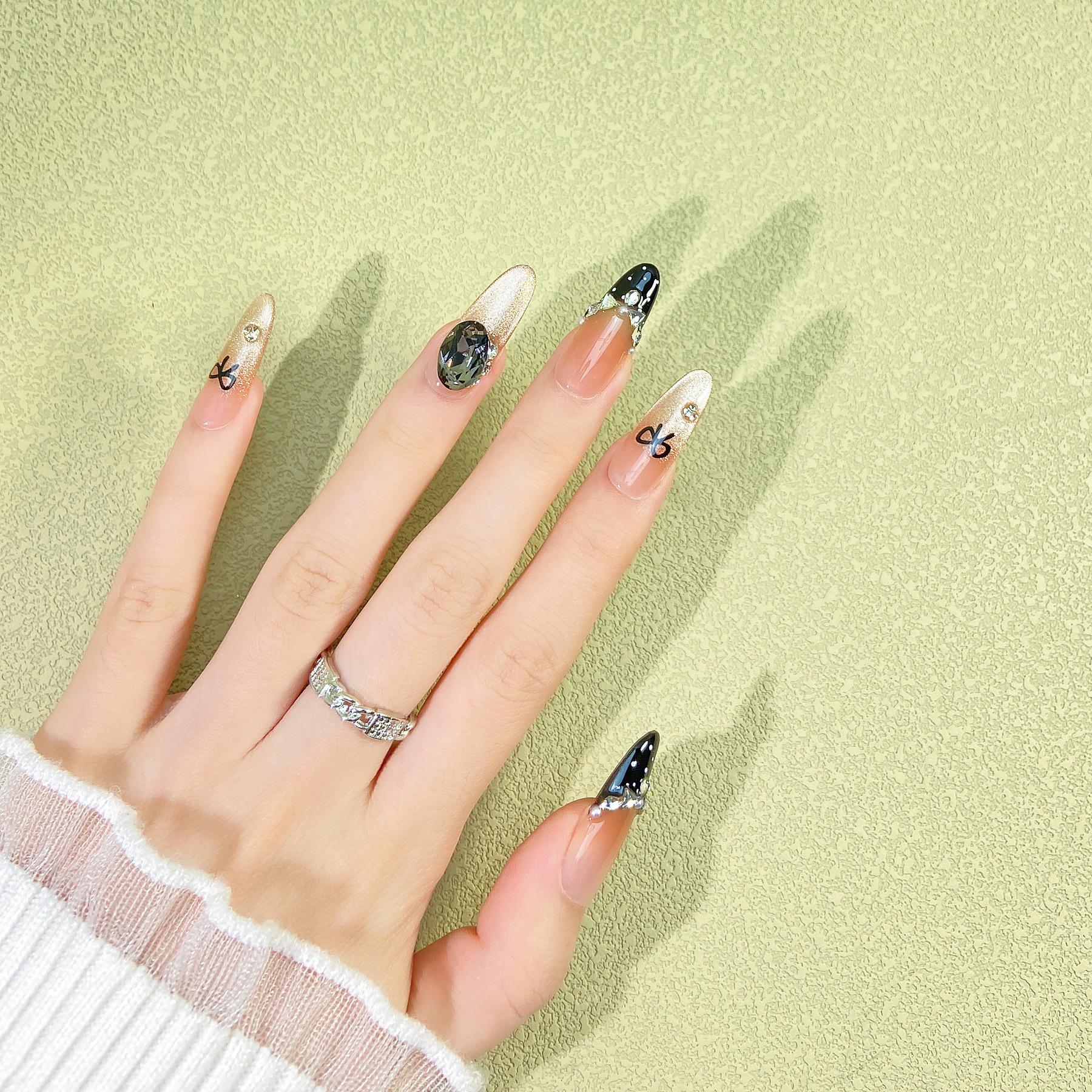 Trendy Cat Eye Nail Art with Gradient Polka Dots & Large Rhinestones
