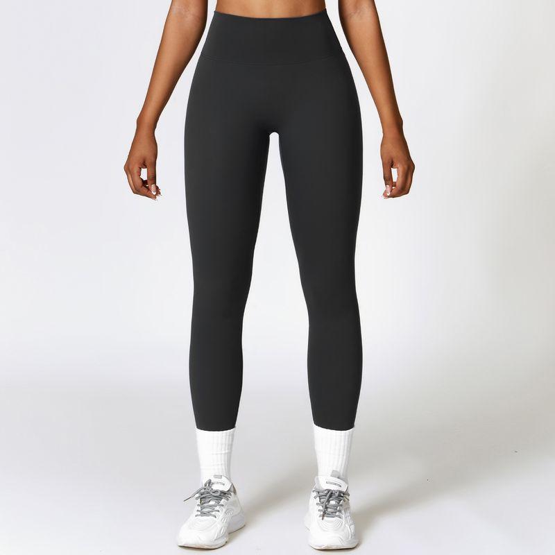 Nude Feel Yoga Pants Women's 2025 New Arrival Peach Hip Seamless Belly Contracting and Close-Fitting Outwear Running Sports Quick-Drying Fitness Pants
