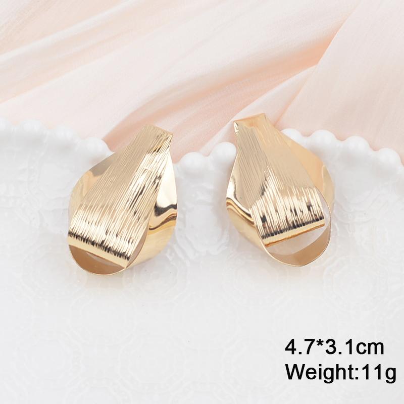 Boucles d'oreilles pendantes torsadées en métal pour femmes, couleur or, alliage enveloppé, déclaration géométrique irrégulière, oreille féminine, zircon, pendientes mujer