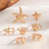 Ensemble de bagues, bijoux style océan, étoile de mer, bijoux articulation conque, bagues empilées irrégulières.