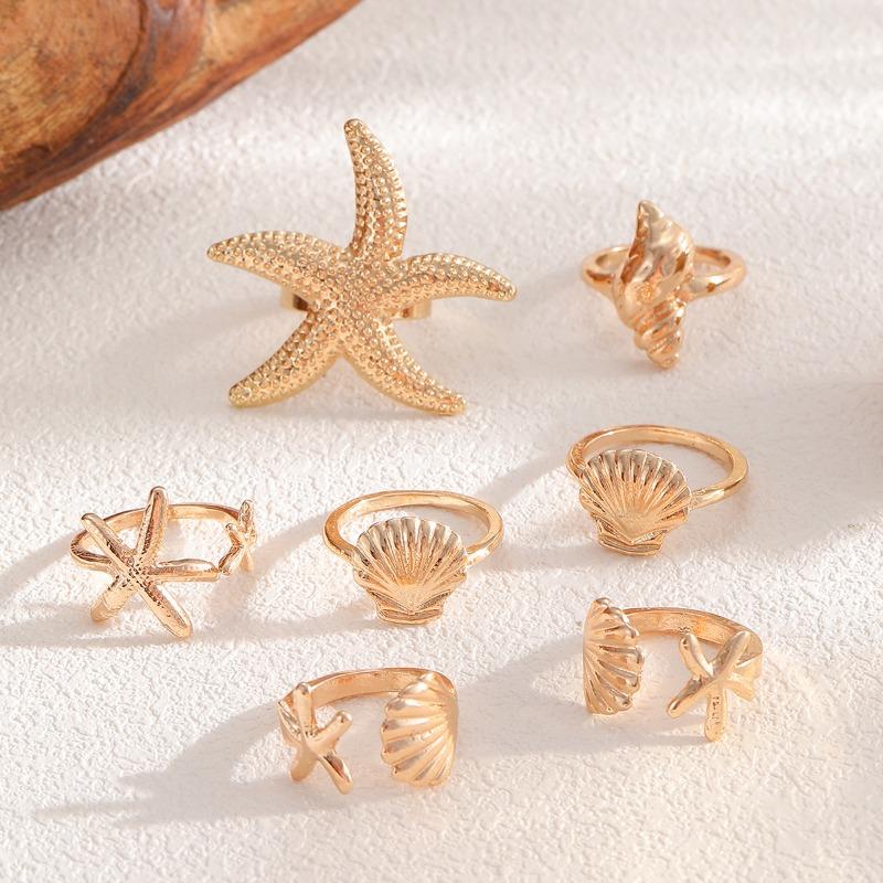 Ensemble de bagues, bijoux style océan, étoile de mer, bijoux articulation conque, bagues empilées irrégulières.
