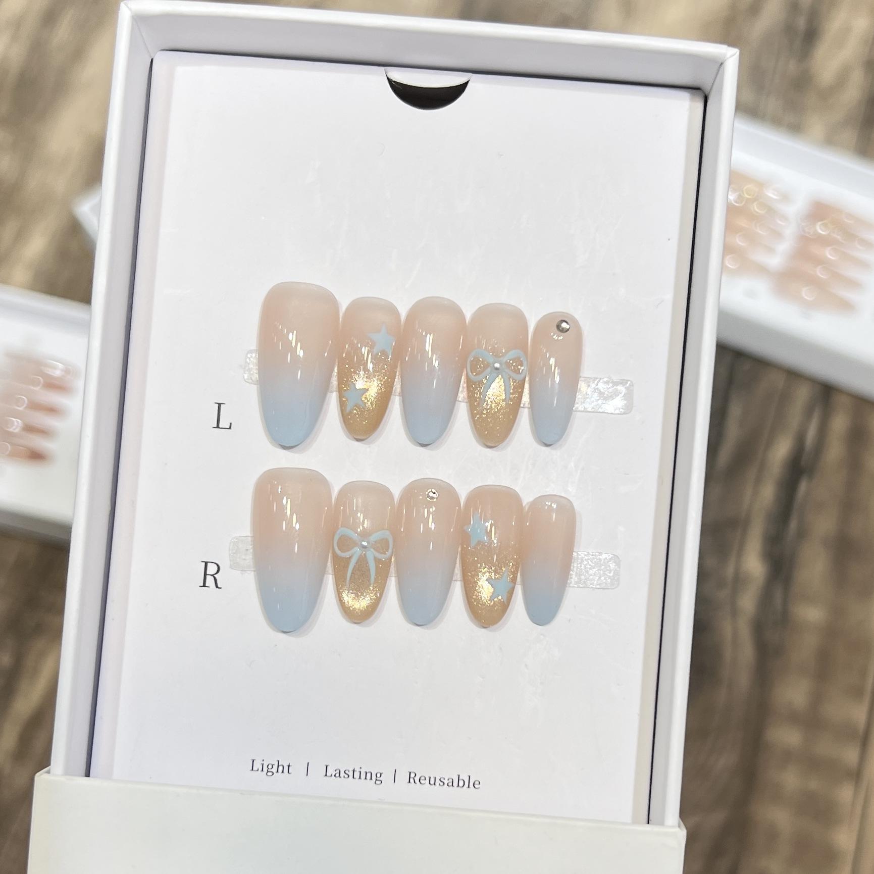 

Ледяной голубой летний нейл-арт кристалл кошачий глаз французский темперамент нюдовый бант чистая рука носить доспехи large L