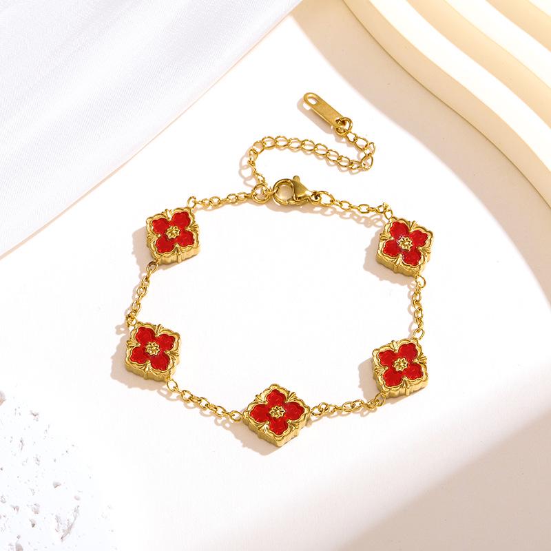 Retro Craftsmanship 18K Titanium Steel Four-Leaf Clover Jewelry Set: Flower Necklace, Bracelet, Earrings.