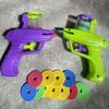Non-Toxic Mini Carrot Flying Disc Launcher Toy Gun Eva Battle Outdoor Multi Person Sports Soft Bullet Gun Safety Carrot Flying Saucer Gun